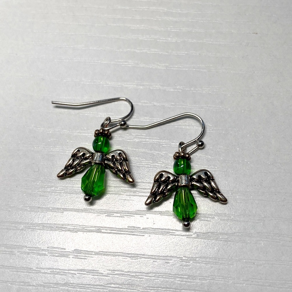 Handmade green angel beaded earrings.